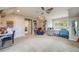 Spacious bedroom with good natural light and comfortable sitting area at 1221 Havenwood Way, Castle Pines, CO 80108
