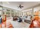 Spacious living room with floor to ceiling windows offering scenic outdoor views at 1221 Havenwood Way, Castle Pines, CO 80108