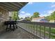 Enjoy the outdoors on the cozy balcony, perfect for grilling with views of the parking area at 8335 Fairmount Dr # 2-105, Denver, CO 80247
