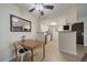 Cozy eat in kitchen features bright white cabinetry at 8335 Fairmount Dr # 2-105, Denver, CO 80247