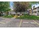 Mailboxes and limited parking in front of community buildings at 8335 Fairmount Dr # 2-105, Denver, CO 80247