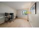 Versatile office space featuring ample natural light, hardwood flooring, and neutral walls at 8335 Fairmount Dr # 2-105, Denver, CO 80247