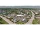 Overhead shot of shopping district, highlighting property's location near retail and commercial areas at 455 Saddlewood Cir, Highlands Ranch, CO 80126