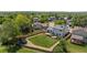 Fenced backyard with deck, lush lawn and mature trees offering privacy and space at 455 Saddlewood Cir, Highlands Ranch, CO 80126