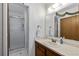 Bathroom with a shower and vanity at 455 Saddlewood Cir, Highlands Ranch, CO 80126