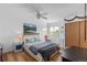 Bright bedroom with a ceiling fan, hanging chair, and a calming aesthetic at 455 Saddlewood Cir, Highlands Ranch, CO 80126