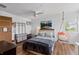Bright bedroom with a hanging chair, dresser, and calming aesthetic at 455 Saddlewood Cir, Highlands Ranch, CO 80126