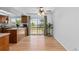 Dining area with hardwood floors and sliding glass doors to the backyard at 455 Saddlewood Cir, Highlands Ranch, CO 80126