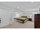 Spacious main bedroom featuring plush carpeting, recessed lighting, and ample closet space at 455 Saddlewood Cir, Highlands Ranch, CO 80126