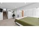 Main bedroom with carpet, closet, and ensuite bathroom at 455 Saddlewood Cir, Highlands Ranch, CO 80126
