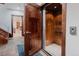 Private elevator with rich wood interior providing easy access between floors at 467 Saint Paul St, Denver, CO 80206