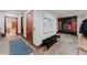 Inviting mudroom with slate tile flooring, built-in storage, and a convenient bench at 467 Saint Paul St, Denver, CO 80206