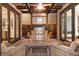 Cozy outdoor kitchen with a grill, seating, and stylish decor at 467 Saint Paul St, Denver, CO 80206
