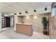 Basement bar area with built-in shelving and unique wallpaper at 206 S 22Nd Ave, Brighton, CO 80601