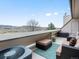 Relaxing outdoor balcony with comfortable seating and scenic views of the surrounding landscape at 4226 S Eldridge St # 207, Morrison, CO 80465