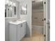 Bright bathroom featuring sink, vanity, mirror, and bathtub in the background at 4226 S Eldridge St # 207, Morrison, CO 80465
