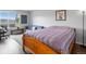 Comfortable bedroom with a large bed, modern furnishings, and ample natural light from large windows at 4226 S Eldridge St # 207, Morrison, CO 80465