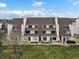 A multi-unit home with a green lawn and a cloudy blue sky above at 4226 S Eldridge St # 207, Morrison, CO 80465