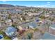 Aerial view showcasing the house, backyard, and surrounding neighborhood at 8430 S Oak St, Littleton, CO 80127