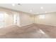 Finished basement with carpet and recessed lighting, ideal for recreation or additional living space at 3355 S Emerson St, Englewood, CO 80113