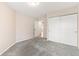 Comfortable bedroom with soft carpet, a spacious closet, and natural light at 3355 S Emerson St, Englewood, CO 80113