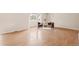Inviting living room featuring wood floors, stylish armchairs, and a cozy rug at 3355 S Emerson St, Englewood, CO 80113