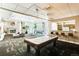 Large game room with a pool table, fireplace, bar, lounge, and seating to relax at 601 W 11Th Ave # 815, Denver, CO 80204