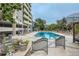 Beautiful pool area with modern lounge seating and verdant landscape in a stylish condo complex at 601 W 11Th Ave # 815, Denver, CO 80204