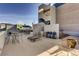 Rooftop deck featuring lounge seating, gas grills, dining areas, and city views at 601 W 11Th Ave # 815, Denver, CO 80204