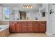 Large bathroom with double sinks, tub and a large window with lots of light at 24682 E Ontario Dr, Aurora, CO 80016