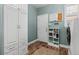 Well-organized mud room with built-in storage, coat hooks, and a convenient drop zone at 24682 E Ontario Dr, Aurora, CO 80016