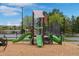 Playground area featuring slides, climbing structures, and a soft landing surface at 24682 E Ontario Dr, Aurora, CO 80016