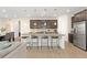 Modern kitchen features granite countertops, stainless steel appliances, and a large kitchen island at 16345 Milwaukee St, Thornton, CO 80602