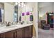 Elegant bathroom with dual sinks, tasteful decor, and an inviting atmosphere at 438 Galaxy Dr, Castle Rock, CO 80108