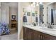 Stylish bathroom with dual sinks, decorative tile, and ample counter space at 438 Galaxy Dr, Castle Rock, CO 80108