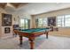 Billiards room with pool table, natural light, and views, perfect for entertaining guests at 438 Galaxy Dr, Castle Rock, CO 80108
