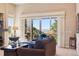 Bright living room with large sliding glass doors providing access to an outdoor balcony with beautiful views at 438 Galaxy Dr, Castle Rock, CO 80108