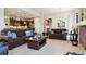Comfortable living room with plush seating and open flow into the kitchen at 438 Galaxy Dr, Castle Rock, CO 80108