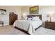 Serene main bedroom featuring a plush bed, soft lighting, and tasteful decor at 438 Galaxy Dr, Castle Rock, CO 80108
