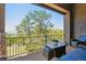 Comfortable outdoor patio with seating area offering scenic views of the lush surroundings and clear blue sky at 438 Galaxy Dr, Castle Rock, CO 80108