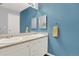 Bathroom featuring double sinks and updated fixtures at 7440 S Blackhawk St # 16-208, Englewood, CO 80112