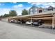 Covered parking area with multiple parking spots available for residents and guests at 7440 S Blackhawk St # 16-208, Englewood, CO 80112