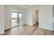 Dining area with sliding doors leading to a covered outdoor space at 98 Wooten Ave, Brighton, CO 80601