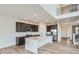 Modern kitchen with stainless steel appliances, an island, and stylish finishes at 98 Wooten Ave, Brighton, CO 80601
