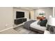 Serene bedroom featuring neutral tones, stylish furnishings, and ample space at 2531 S Hoyt Ct, Lakewood, CO 80227