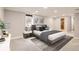 Modern bedroom with neutral colors, cozy decor, and natural light at 2531 S Hoyt Ct, Lakewood, CO 80227