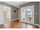 Comfortable room with wood floors, balcony, and access to adjoining rooms at 1827 N Grant St # 502, Denver, CO 80203