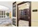 Wine Cellar with wooden cabinets, individual compartments for wine bottles and dim lighting at 1827 N Grant St # 502, Denver, CO 80203