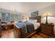 Comfortable bedroom with hardwood floors and natural light at 4406 Orofino Pl, Castle Rock, CO 80108