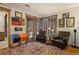 Comfortable living room with unique decor, hardwood floors, and natural light at 4406 Orofino Pl, Castle Rock, CO 80108